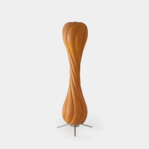 Pepperpod twisted column floor lamp front view with warm textured resin shade and metal tripod base on white background