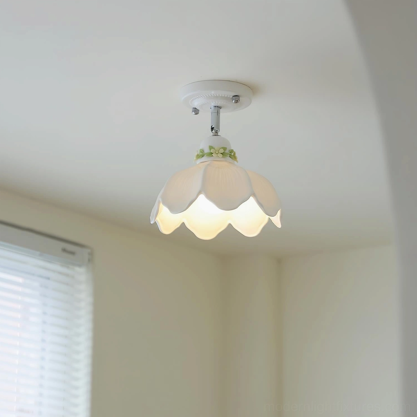 Serene petal scallop ceiling lamp with cutout pattern creating ambient light in bedroom setting
