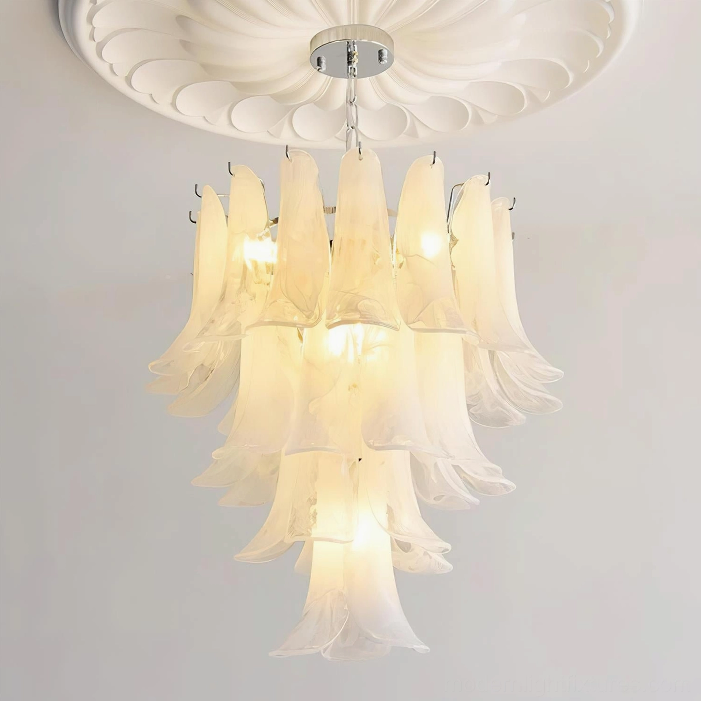 Petal chandelier glass detail showing delicate flared tips and hand-blown craftsmanship quality