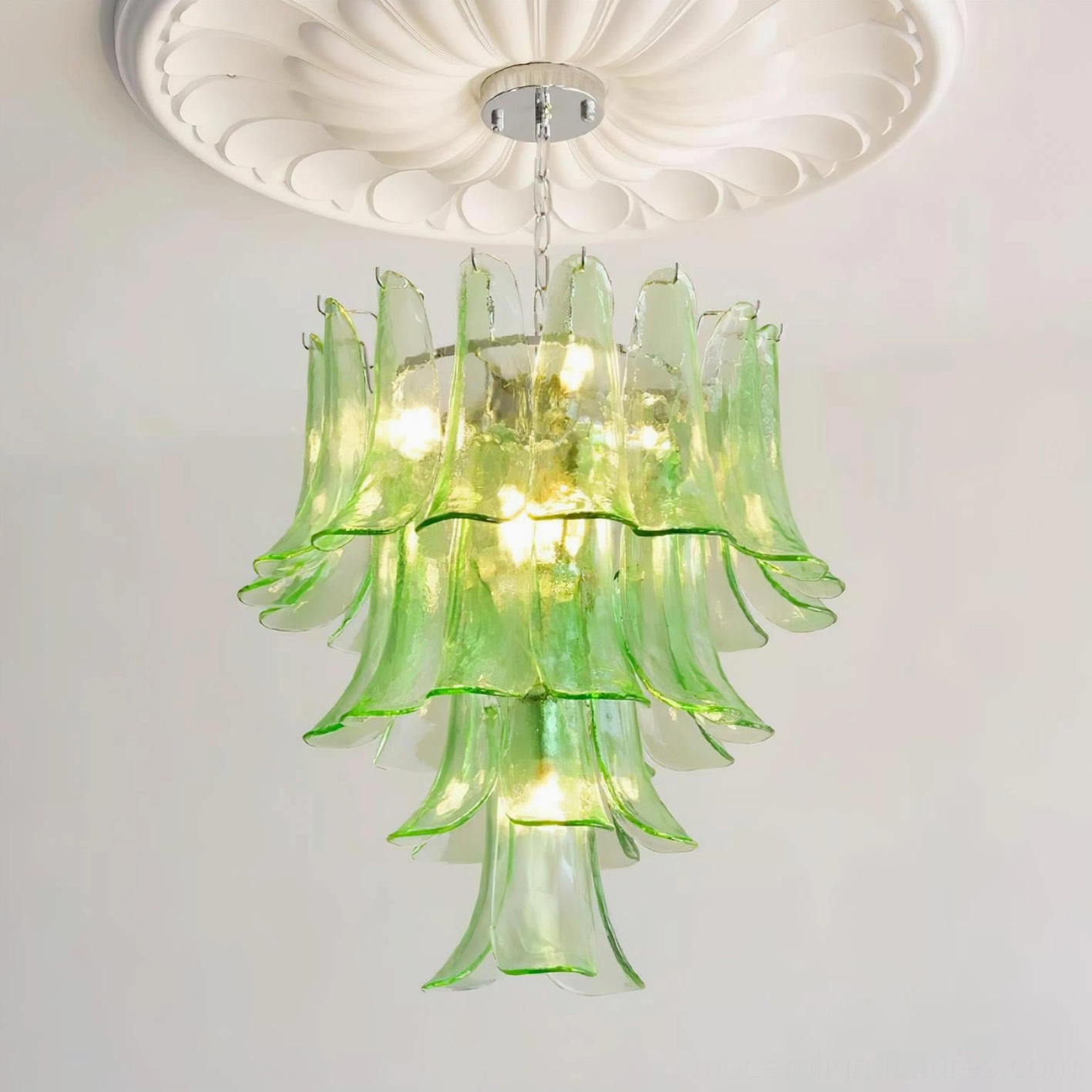 Petal chandelier glass layers creating depth and dimension with soft luminescent glow effect