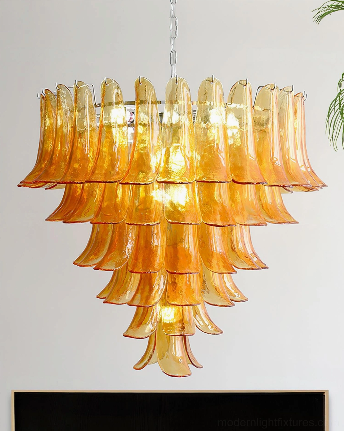Petal chandelier close-up demonstrating hand-blown glass transparency and color saturation levels