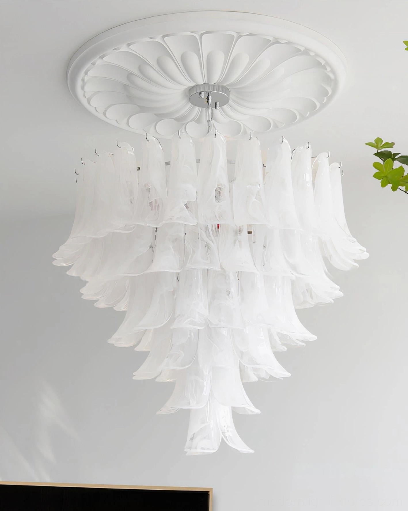 Glass petal chandelier showing how individual petals layer to create complete tiered silhouette