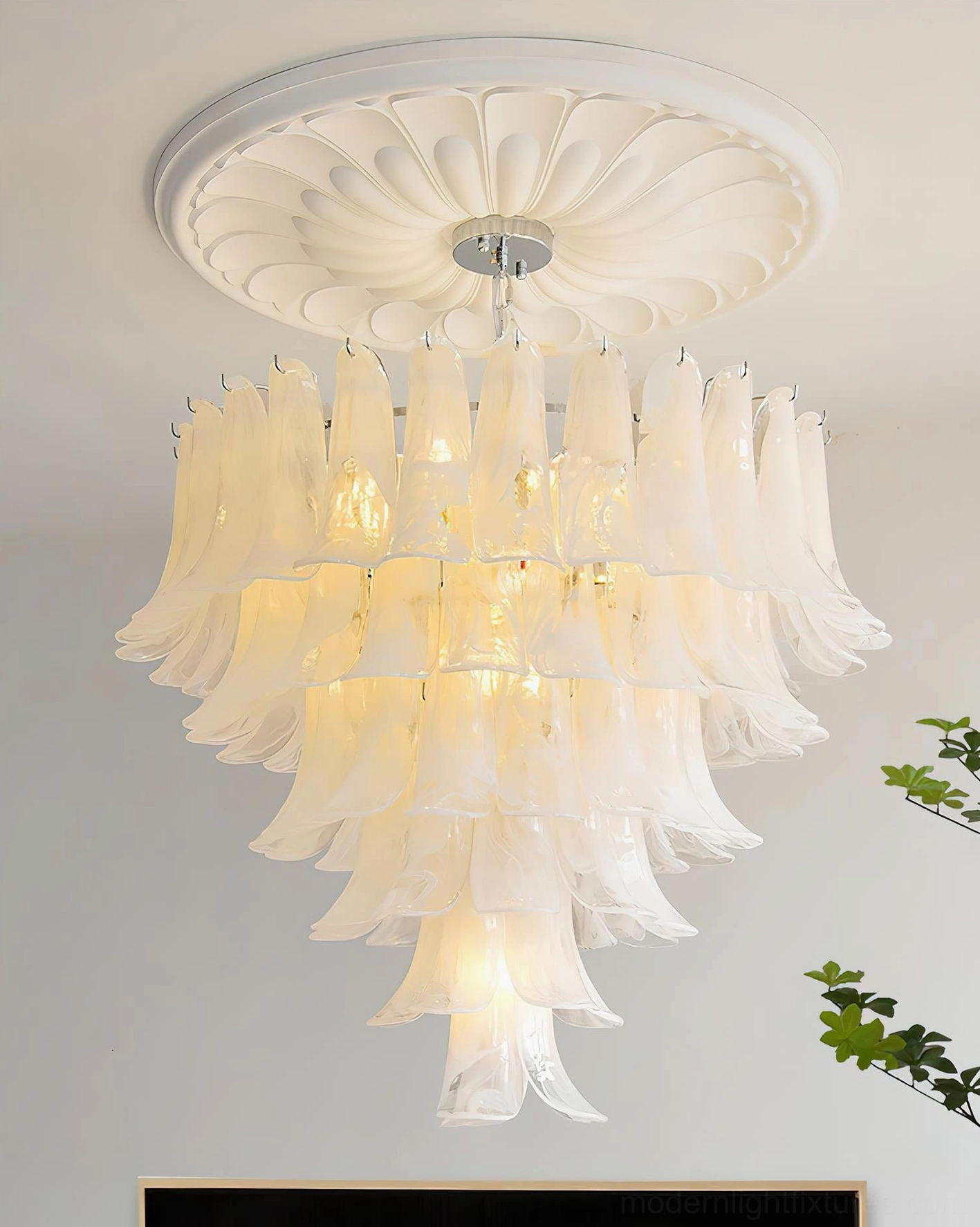 Tiered petal chandelier showing how product scales across different room types and ceiling heights