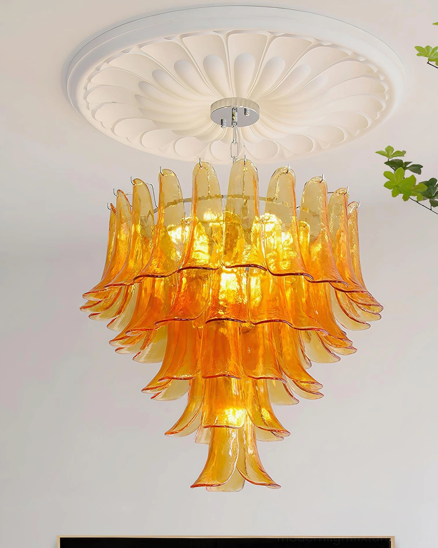 Hand-blown glass petal chandelier creating sculptural art piece and functional lighting solution