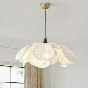 Modern fabric petal ceiling pendant lamp installed in residential interior, overhead view with brass suspension rod and warm lighting