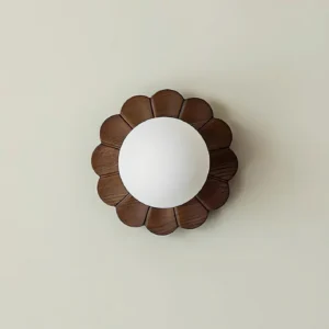 Modern wood petal wall light close-up showing frosted glass shade and natural wood grain detail