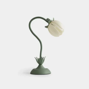 Petala flower table lamp with mint green stem and off-white tulip-shaped shade, studio front view on white background