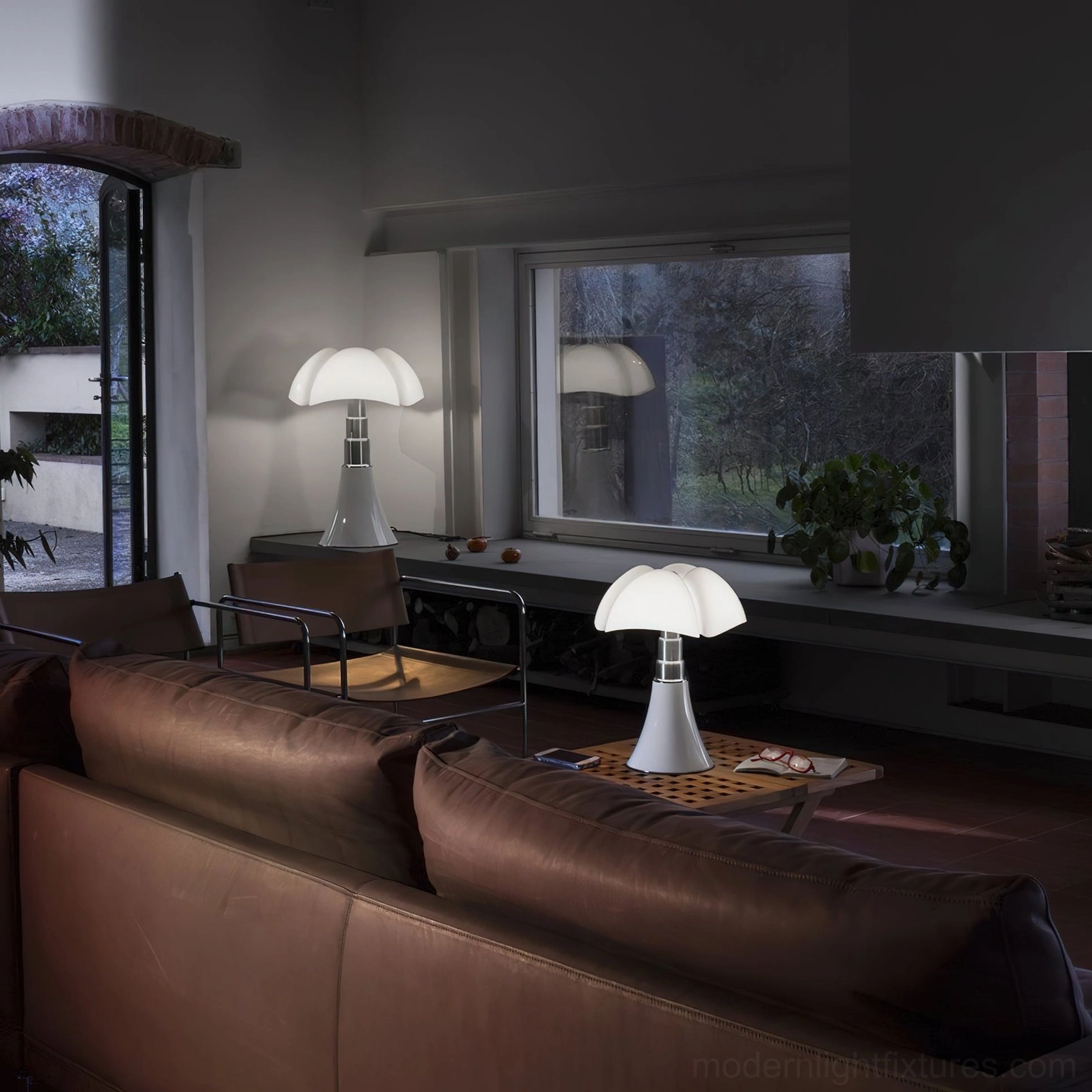 Petalica petal table lamp displayed on designer shelf with complementary home decor objects and accessories