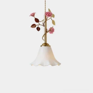 Petalisse floral pendant light with brass stem, pink roses, and white ceramic shade - studio front view