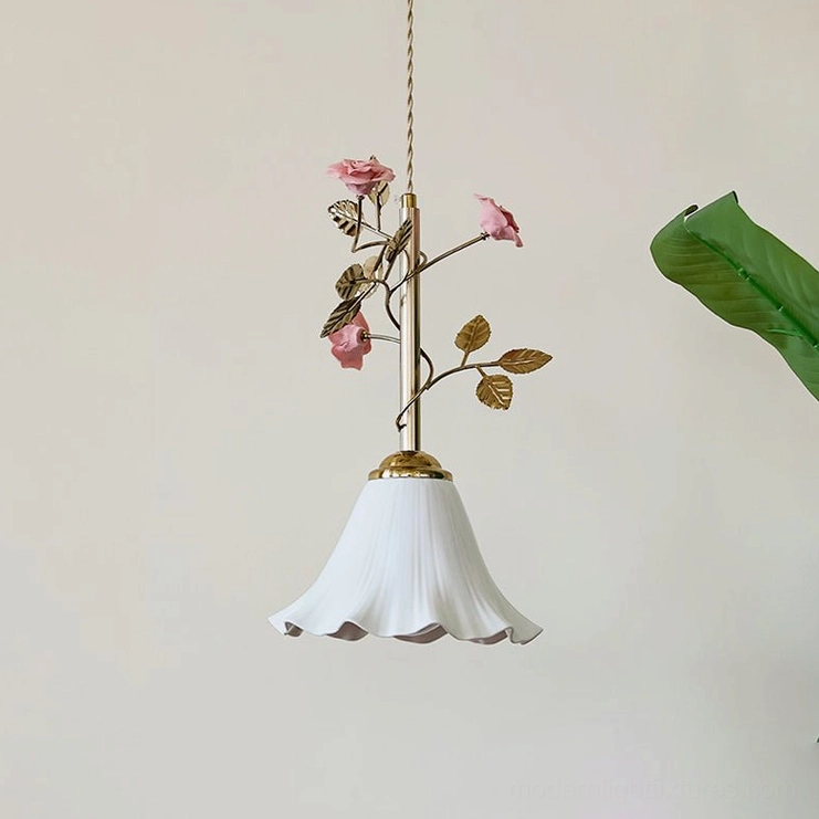 Low angle view of Petalisse pendant showing wide ruffled shade detail and brass rose hardware