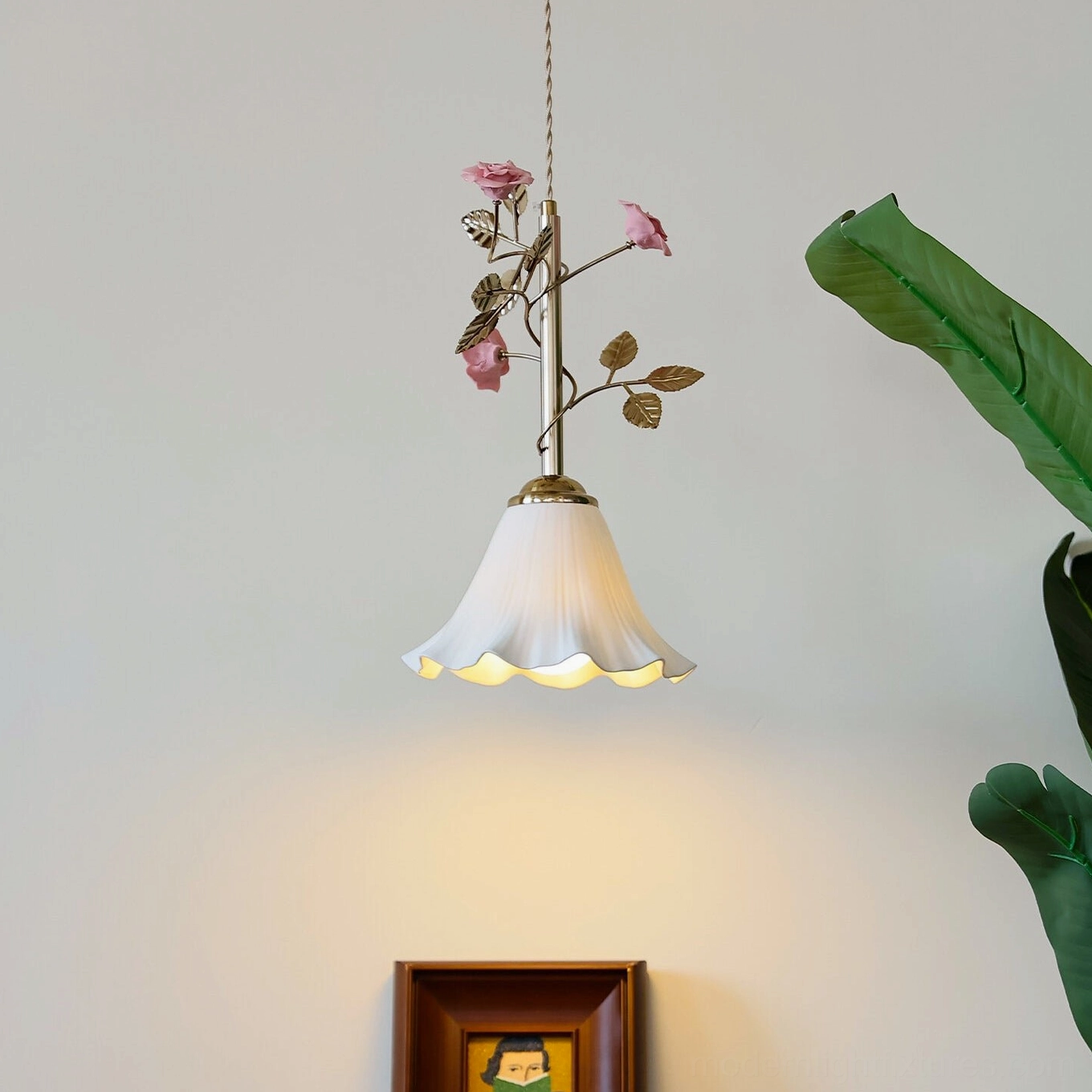 Vintage floral pendant fixture with brass hardware and botanical details - side profile in natural light