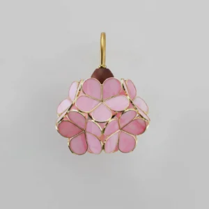 Close-up detail of Petalora wall sconce pink glass petals with gold brass trim and craftsmanship