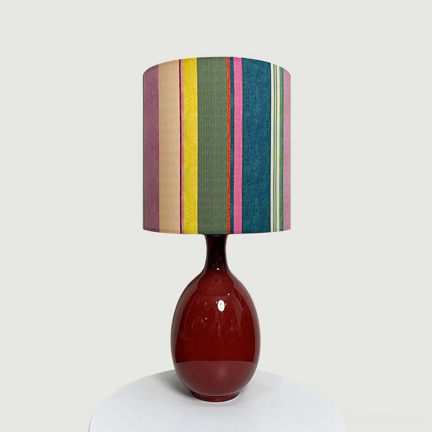 Petalyn table lamp with multicolor vertical stripe fabric shade and wine red ceramic gourd base, studio white background