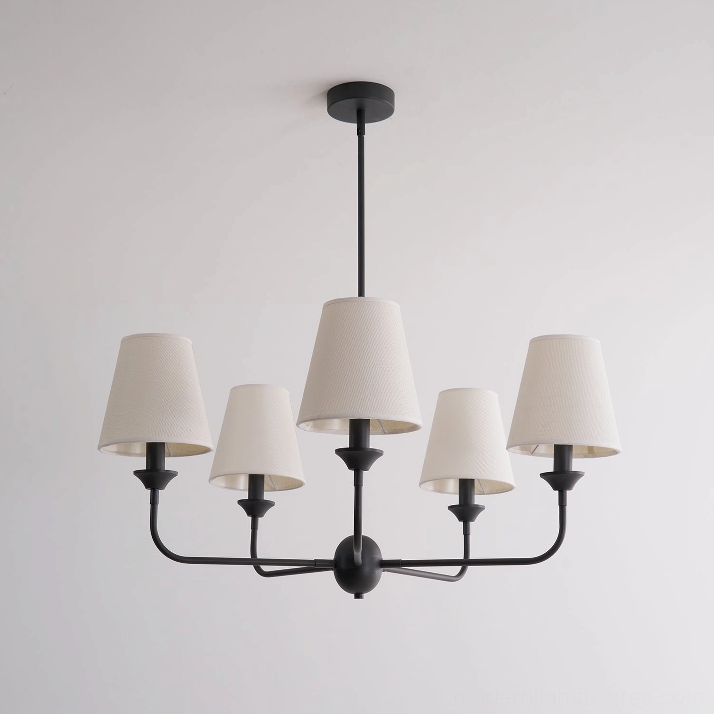 Piaf fabric shade chandelier with extended arm span - top-down studio view