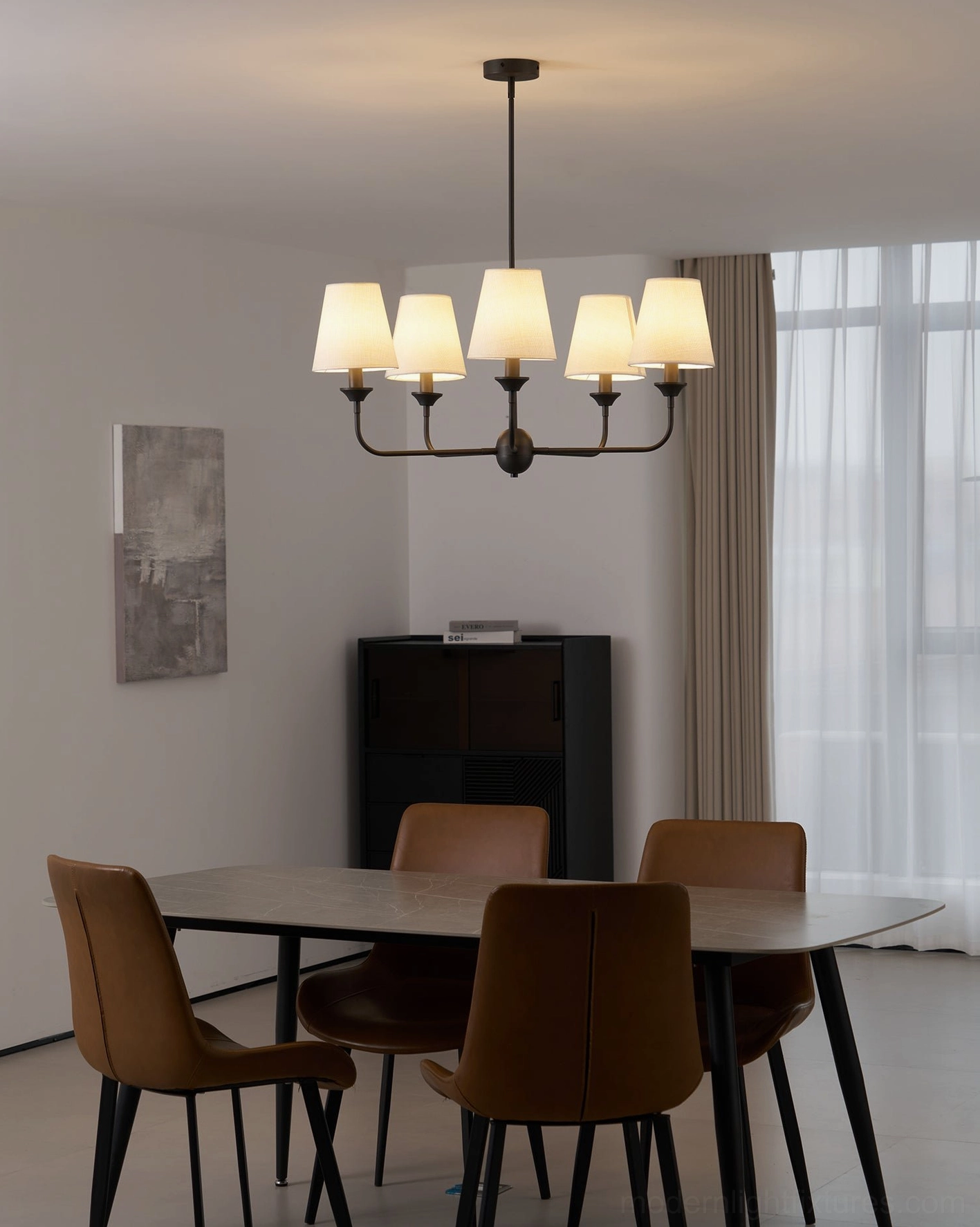 Piaf 5-arm chandelier in contemporary minimalist dining space - eye-level interior view