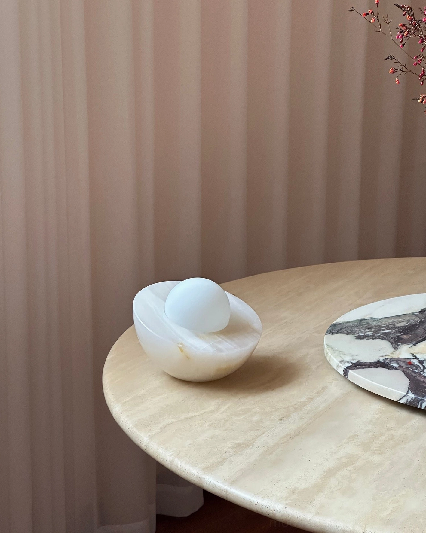 Unlit Piccola onyx table lamp three-quarter view minimalist modern design natural marble finish