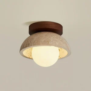 Piedra travertine ceiling light in walnut color wood canopy, close-up detail of stone texture