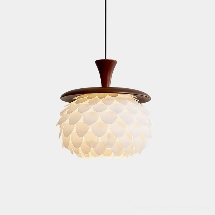 Pinecone pendant light with layered white translucent acrylic petals and walnut wood hardware on plain white background - modern sculptural ceiling fixture