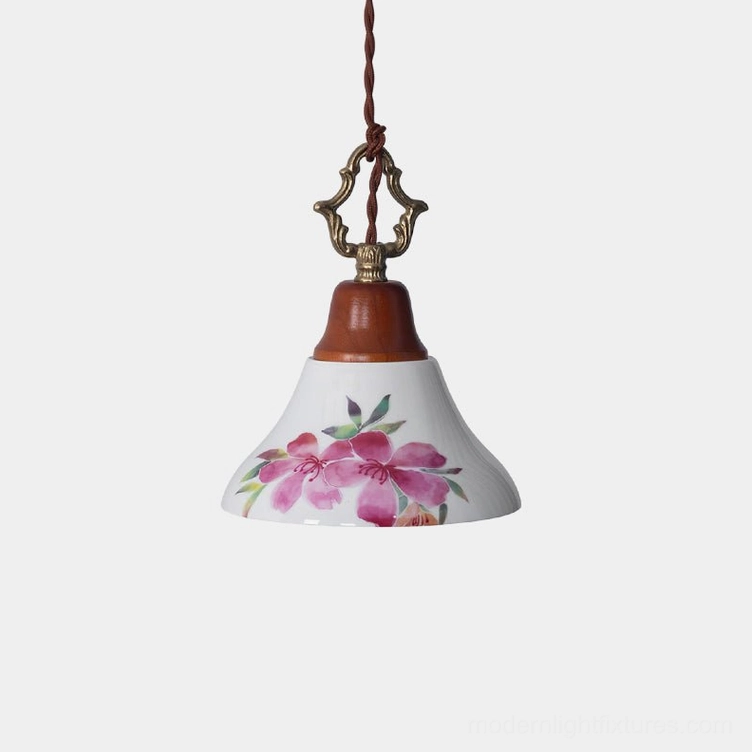 Hand-painted pink azalea ceramic pendant light with brass hardware and wooden crown detail, front view on white background