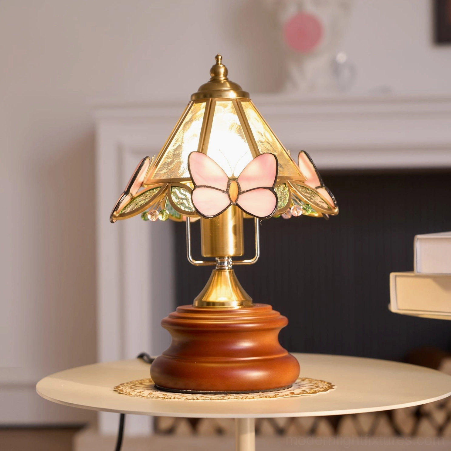 Pink butterfly table lamp from alternate angle displaying full sculptural form and proportions