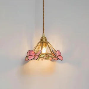 Pink Butterfly Tiffany pendant light with illuminated bulb showing warm ambient glow and pink stained glass butterflies