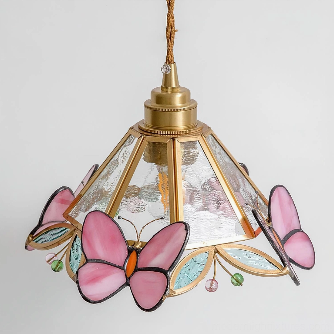 Pink Butterfly Tiffany pendant light warm color palette with brass and pink glass elements