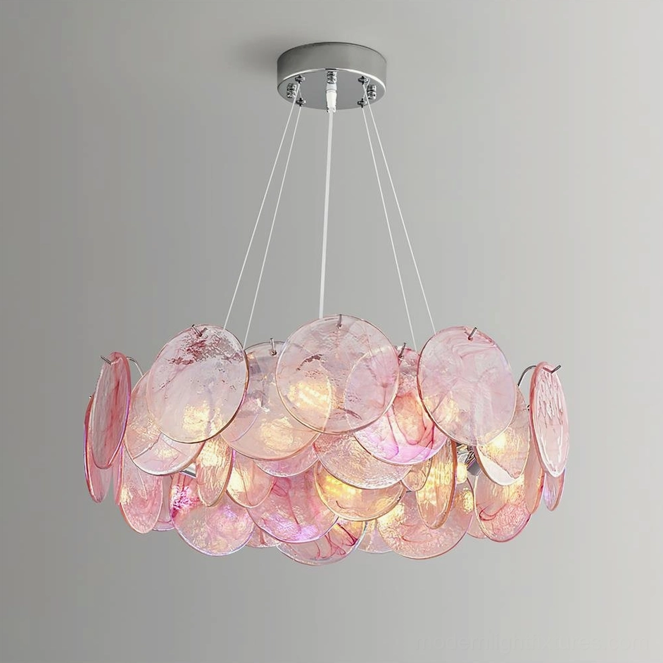 Pink disc chandelier warm illuminated view showing light diffusion through semi-transparent glass