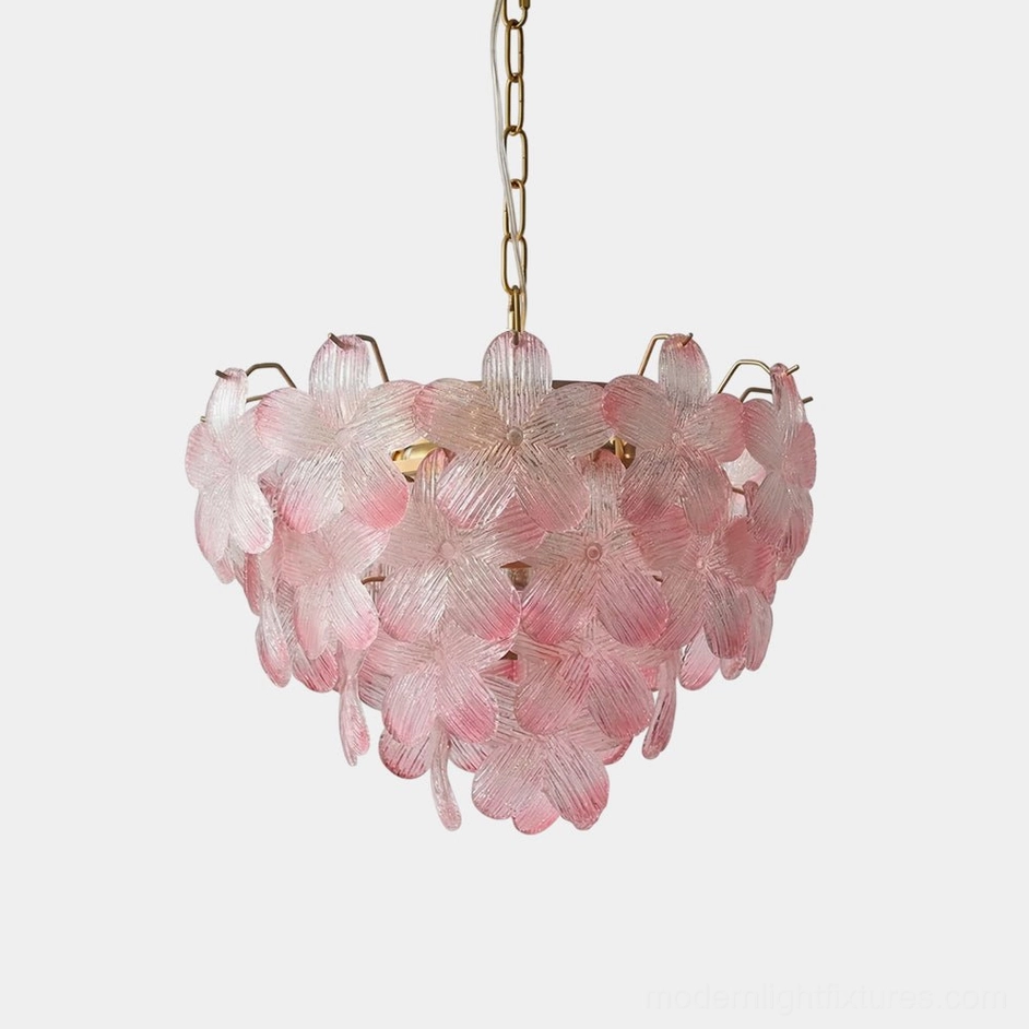 Pink floral glass chandelier front view with gold metal suspension chain, botanical petal design close-up