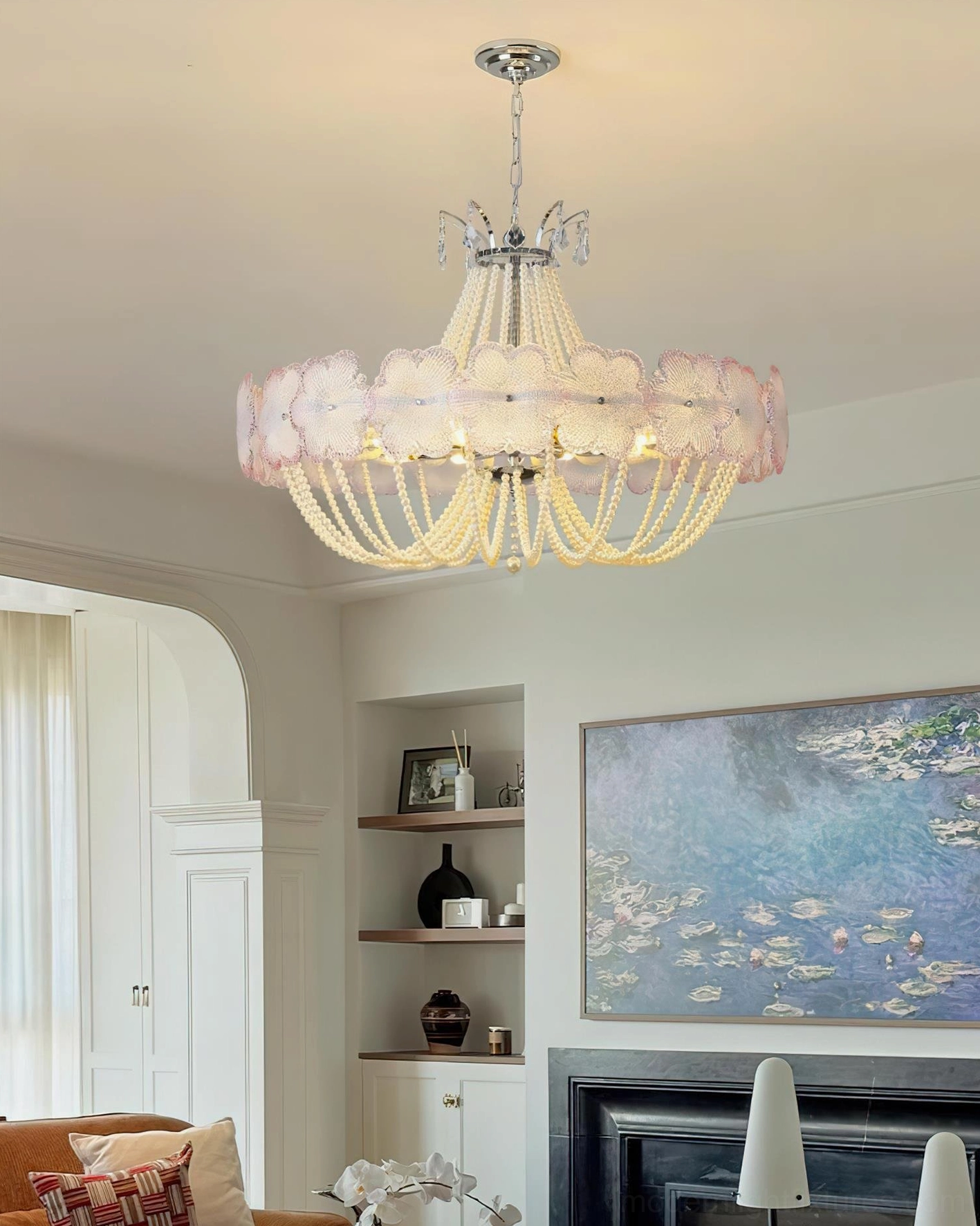 Pink flower glass chandelier in French style living room with fireplace, classic elegant decorative pendant light