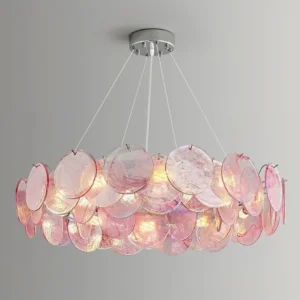 Modern pink glass chandelier three-quarter overhead view illuminated showing warm interior glow and white hanging suspension