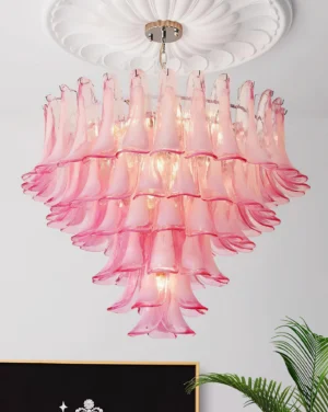 Gradient pink glass petal chandelier installed on ceiling with neoclassical medallion, overhead interior view