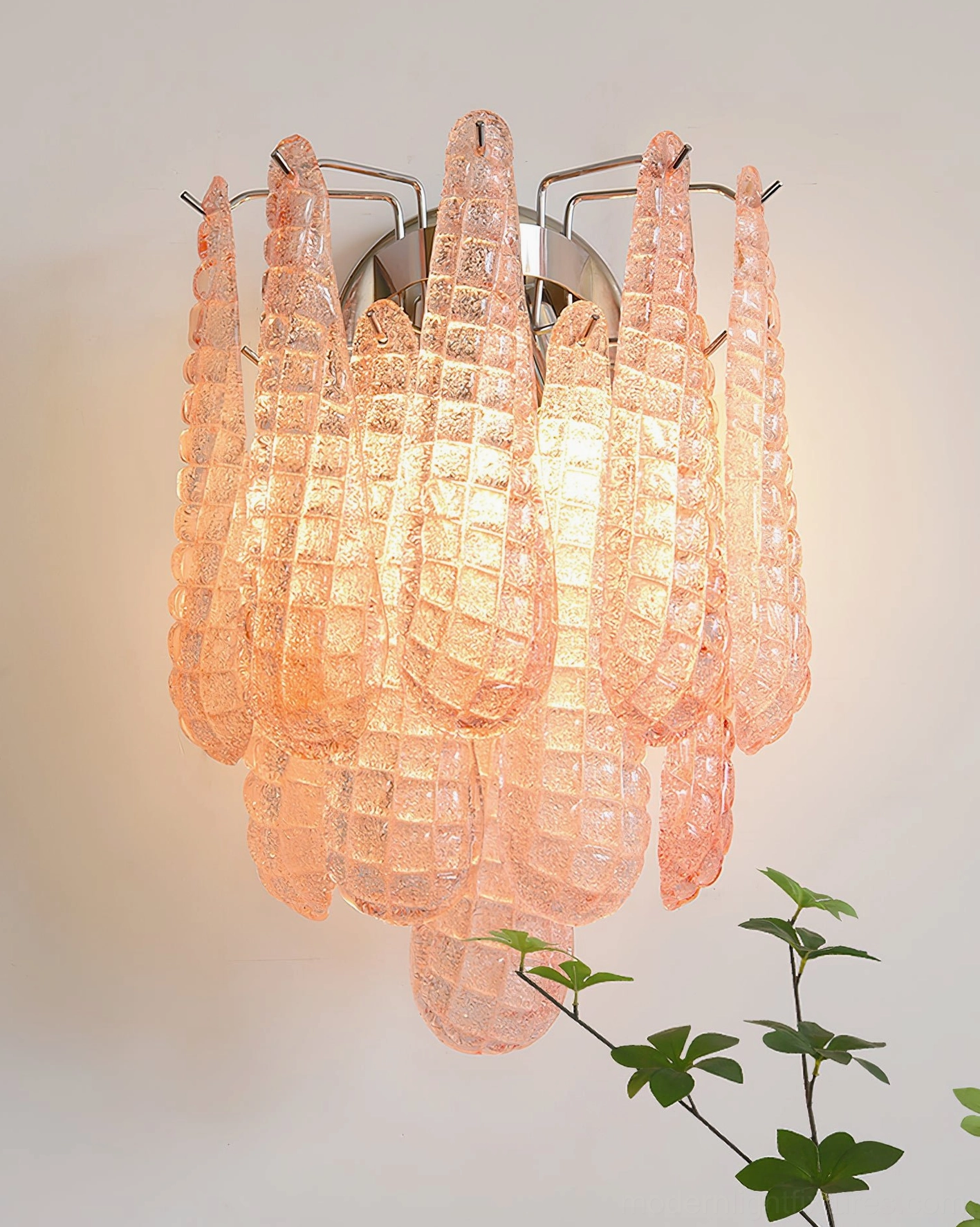 Elegant pink glass wall sconce with pressed ice texture effect on rippled glass panels