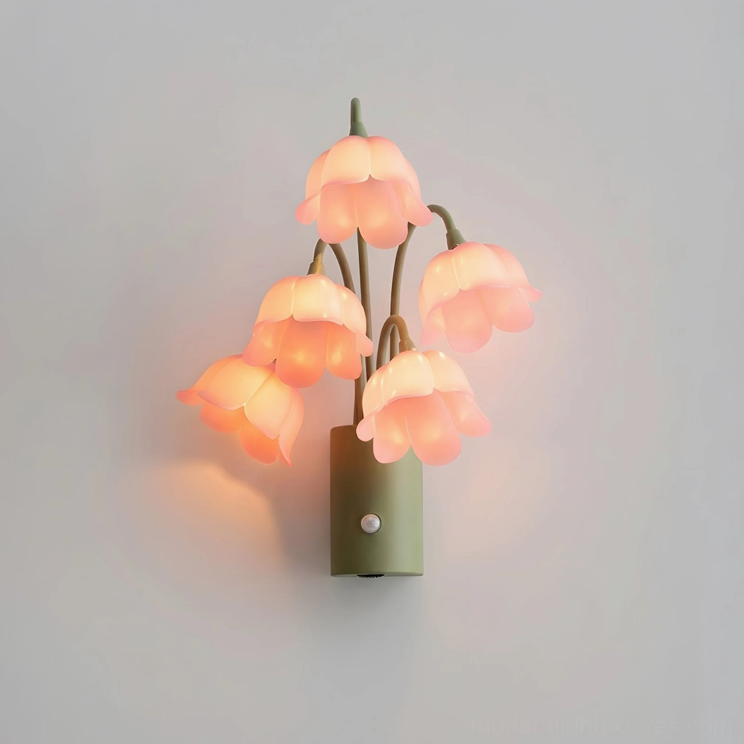 Pink lily-of-the-valley rechargeable motion-sensor wall sconce with five frosted bell-flower acrylic shades and green metal body