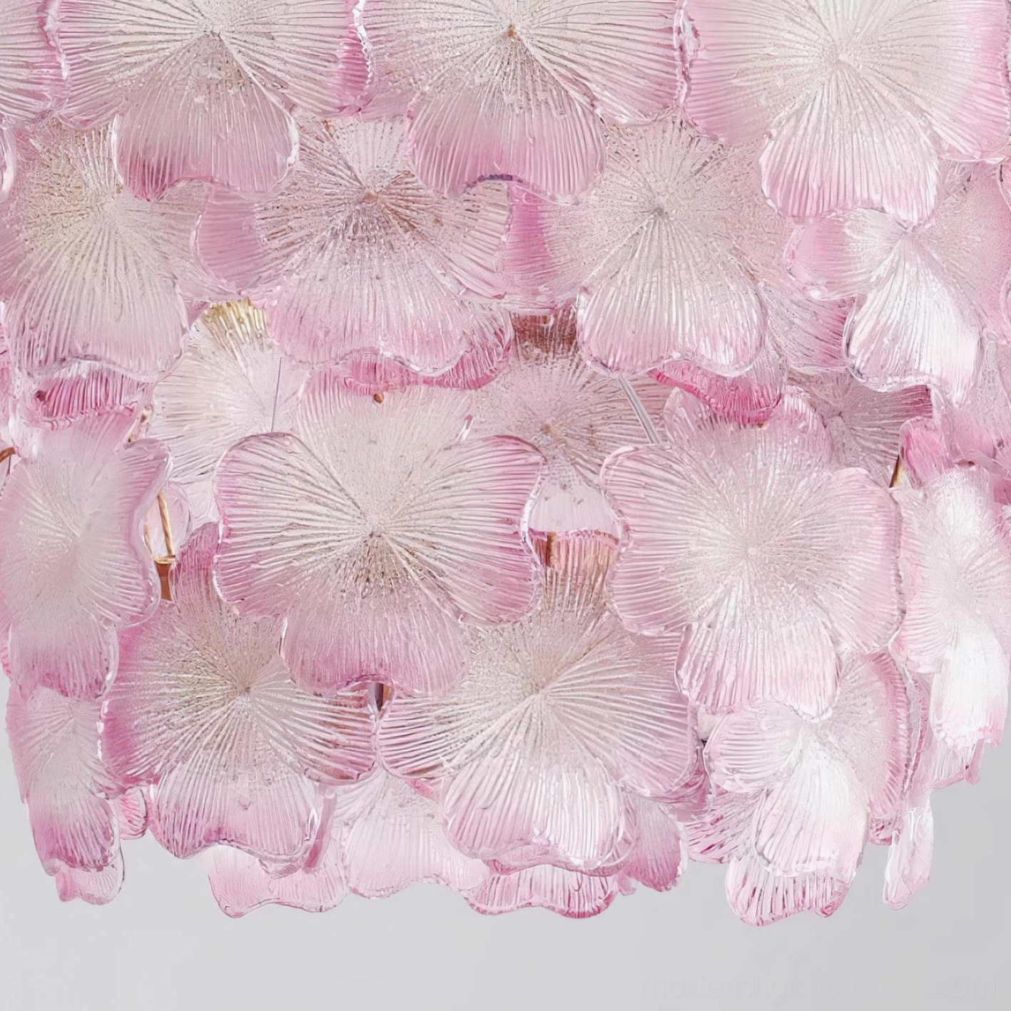 Pink Mika glass chandelier architectural detail showing brass finishing and petal construction