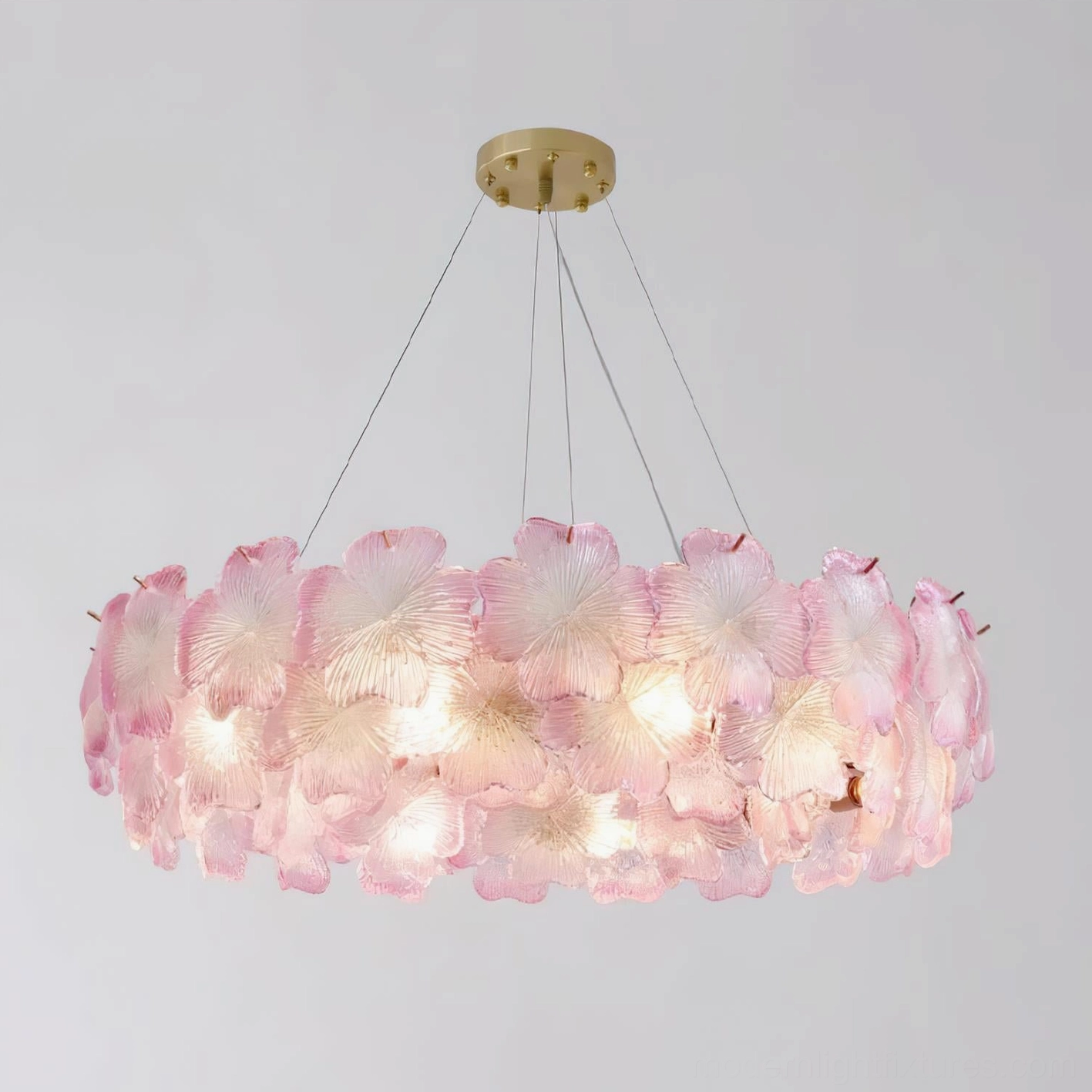 Pink Mika glass flower chandelier showing multiple petal layers and translucent light effect