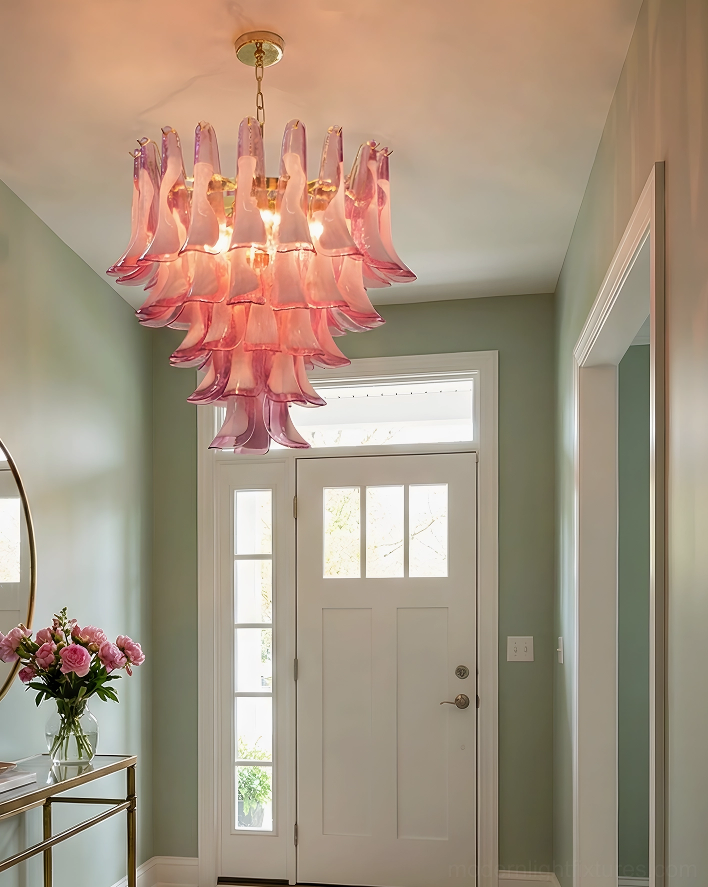 Close-up detail of pink and white handcrafted Murano glass petals on tulip chandelier, showing light refraction and glass artistry craftsmanship