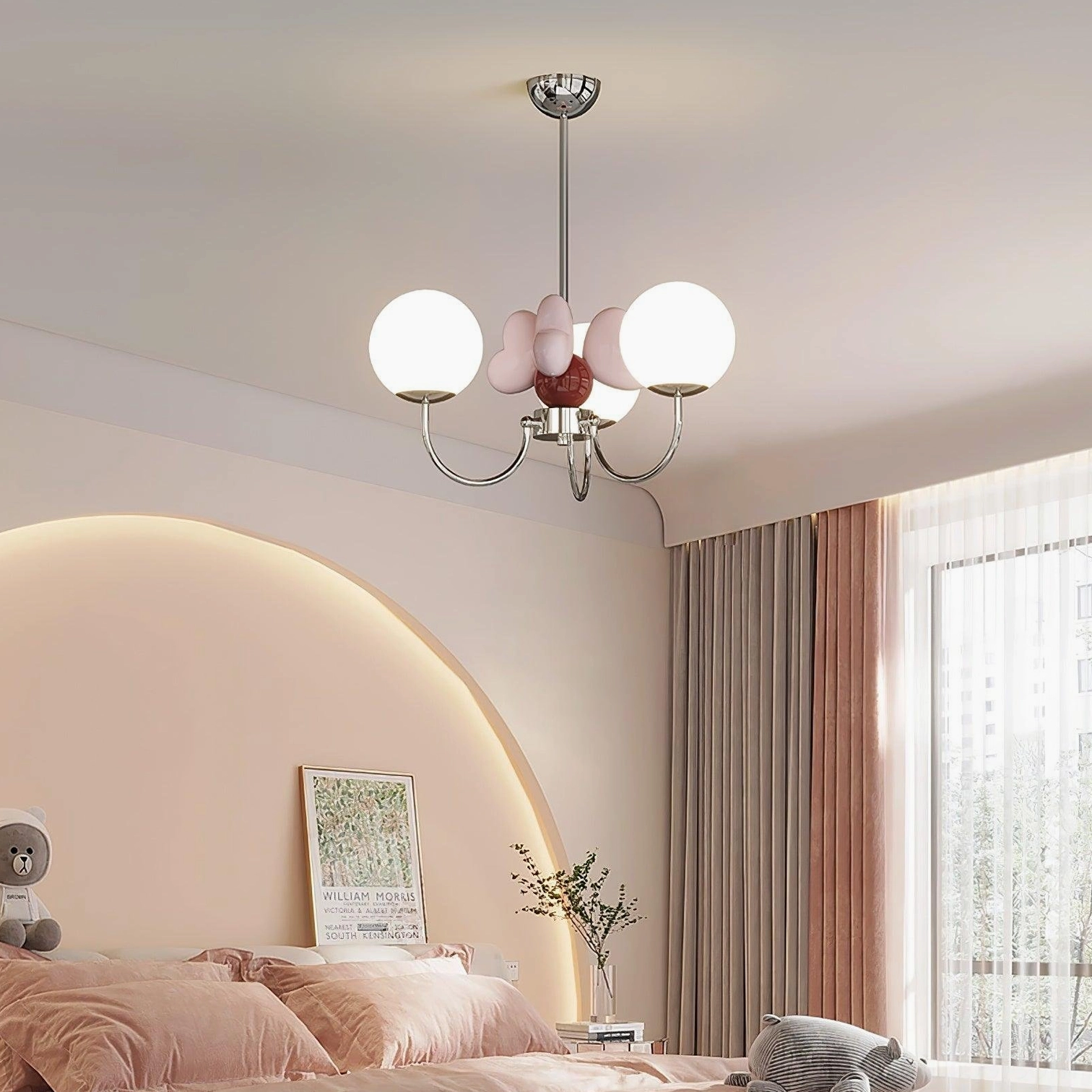 Pink petal glass chandelier installed above bed in pastel bedroom - warm ambient lighting for bedroom decor