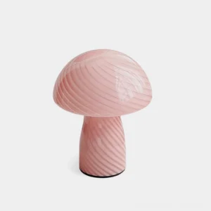 Pastel pink striped Venetian mushroom glass table lamp front view on studio background