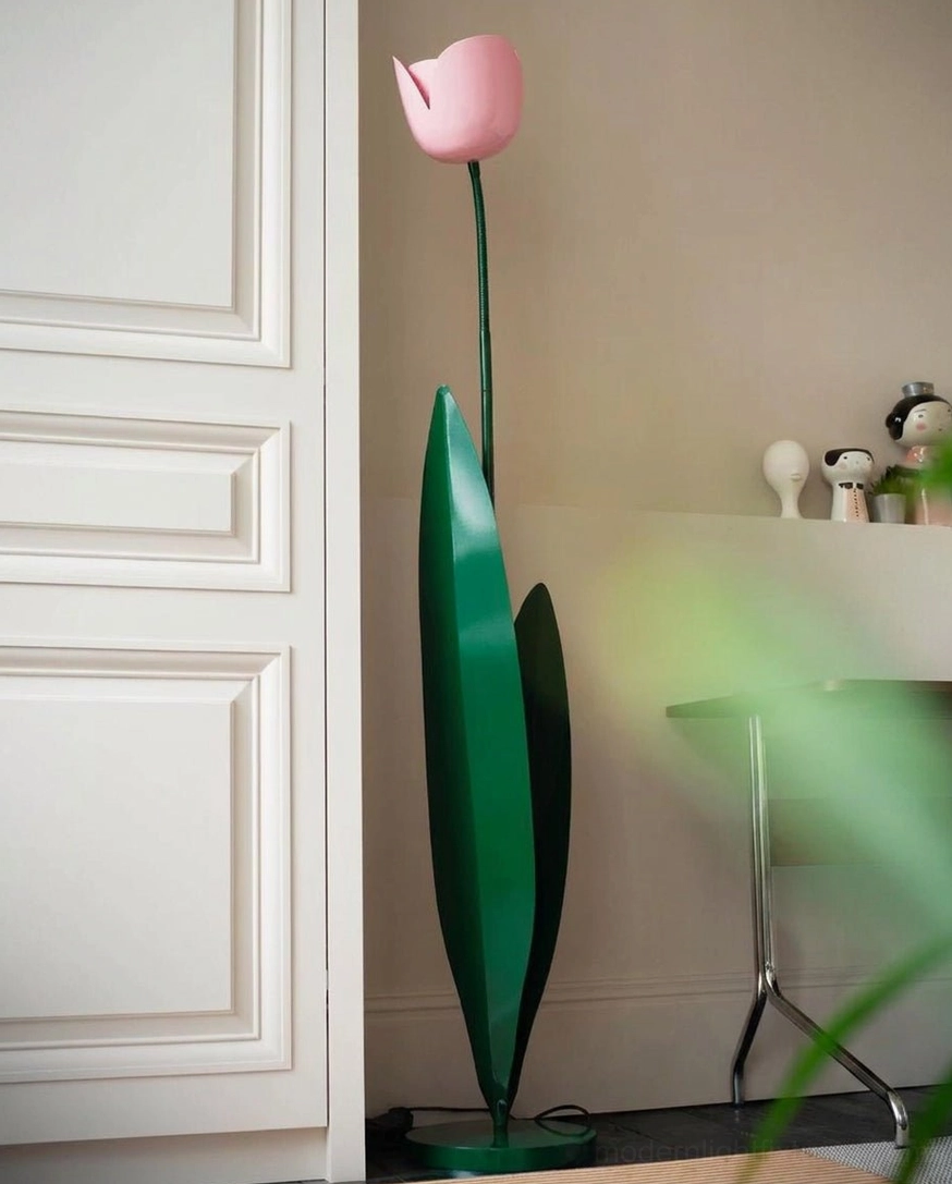 Pink tulip floor lamp in hallway interior with decorative figurines and accessories – soft botanical floor light in home entryway