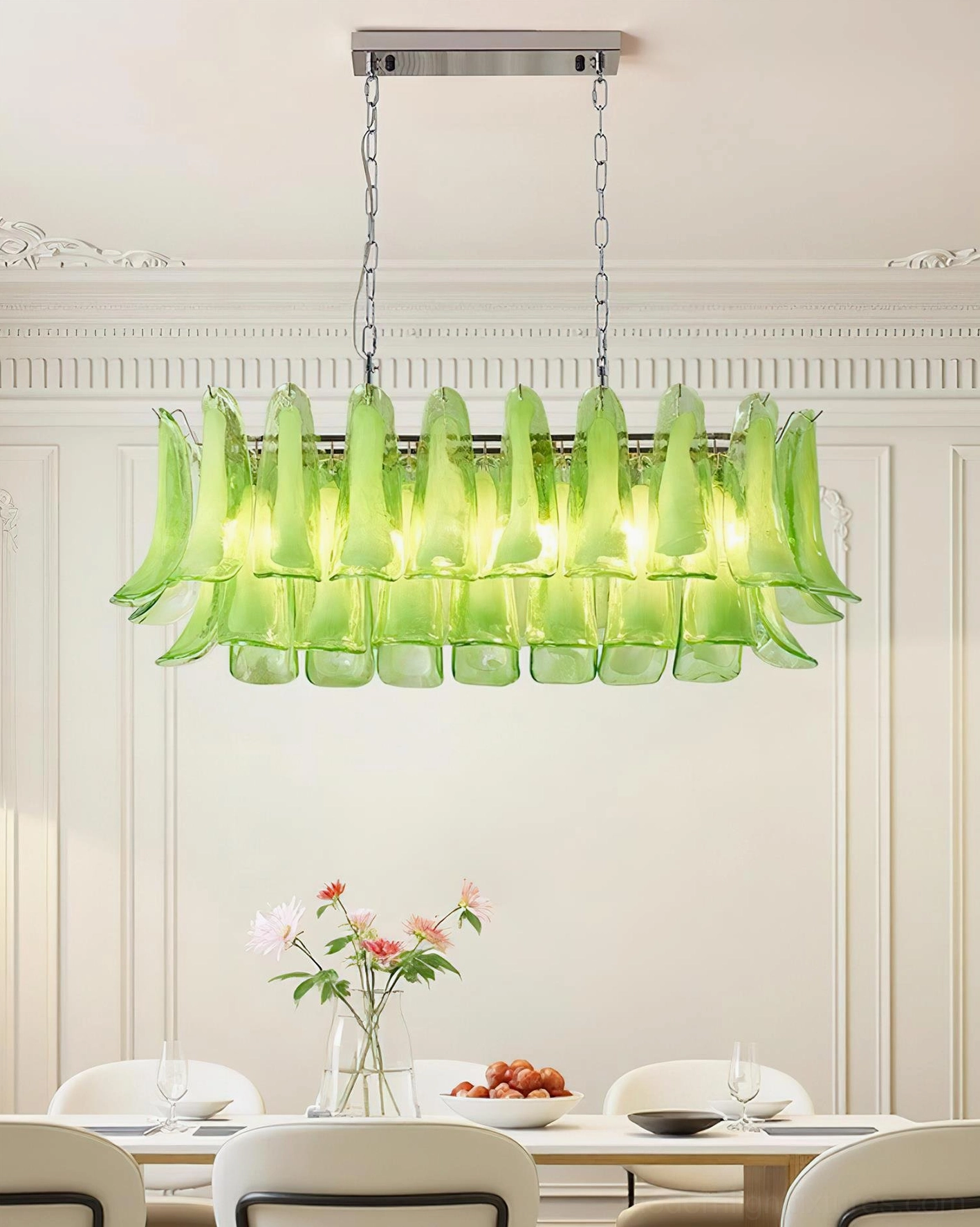 Pink tulip leaf chandelier creating romantic ambiance in sophisticated dining environment