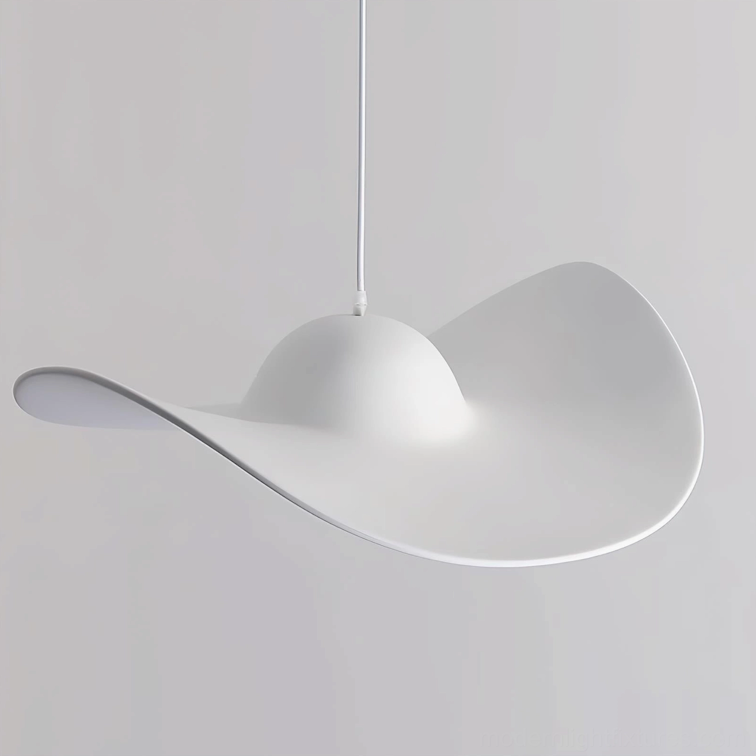 Piuma pendant light ambient illumination - soft diffused light from sculptural resin hat fixture