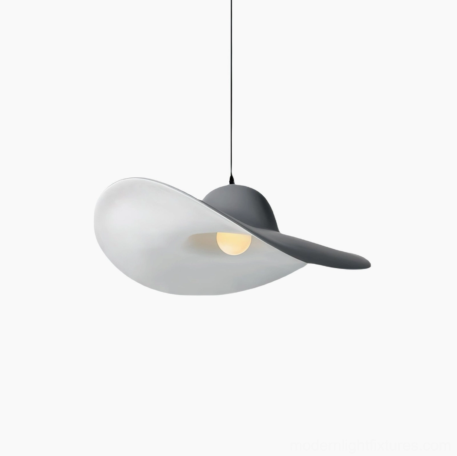 Piuma sculptural pendant light three-quarter view showing curved brim design - matte two-tone resin fixture