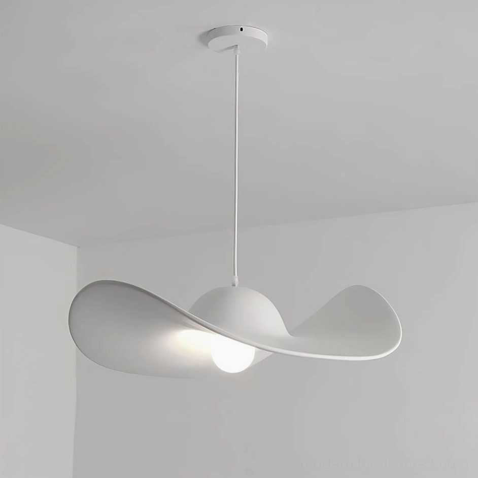 Piuma pendant light in crisp white matte finish - modern minimalist resin fixture with artistic brim design