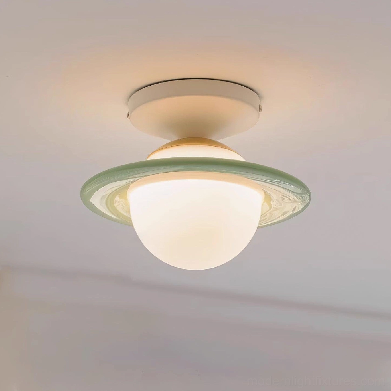 Modern planet flush mount ceiling light creating focal point in minimalist scandinavian bedroom