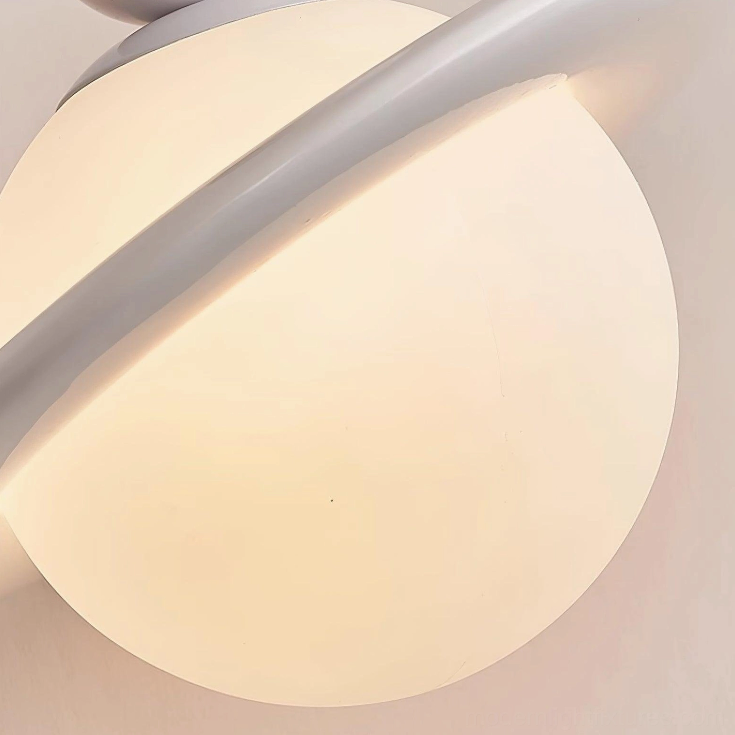 Planet modern ceiling light fixture showing layers and sculptural design elements in detail
