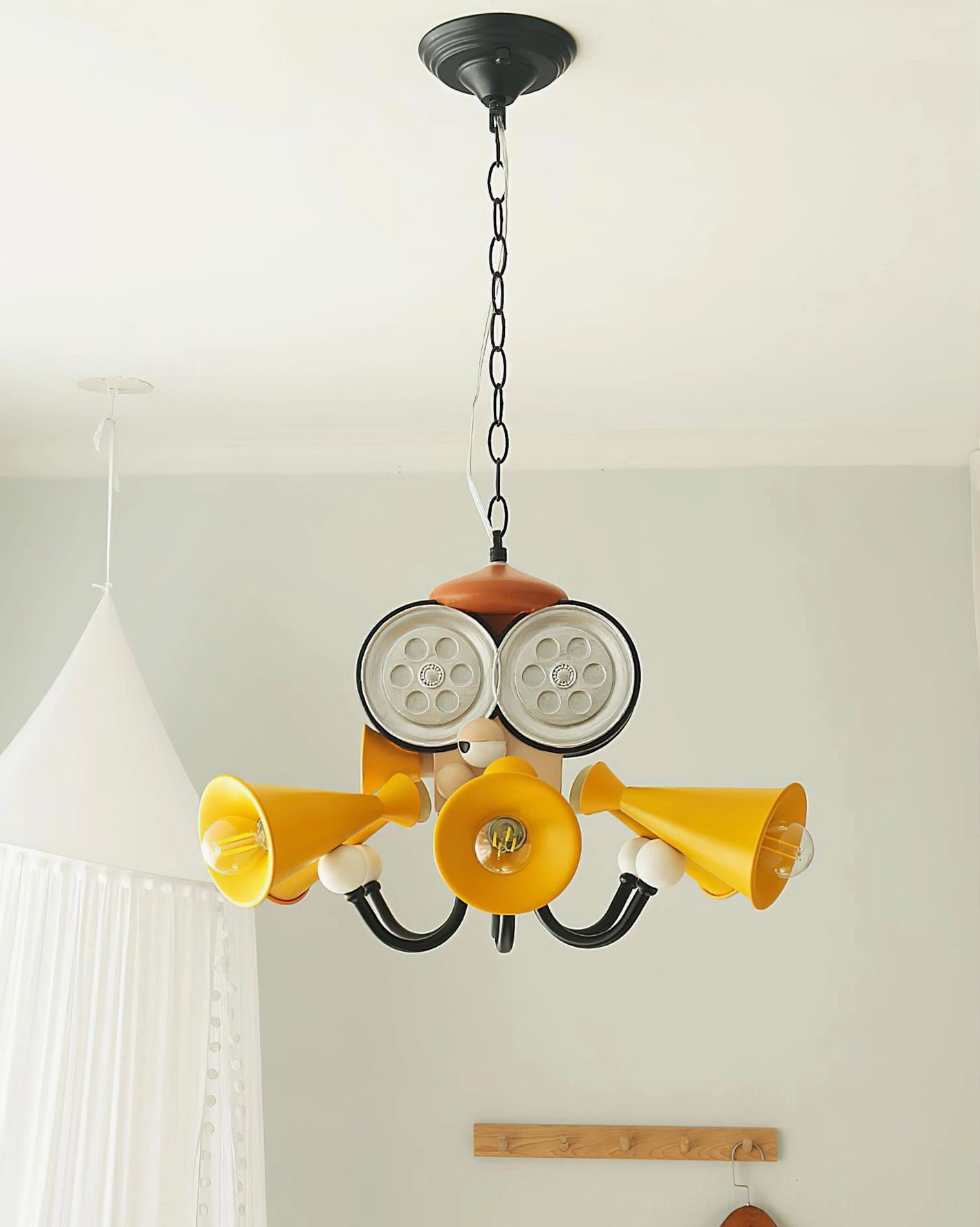 Contemporary octopus pendant light in minimalist kids bedroom with wooden wall hook and white hanging tent decor