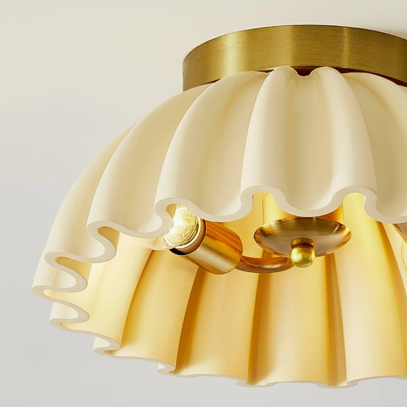 Pleated ceiling light fixture installed in residential home interior lighting application