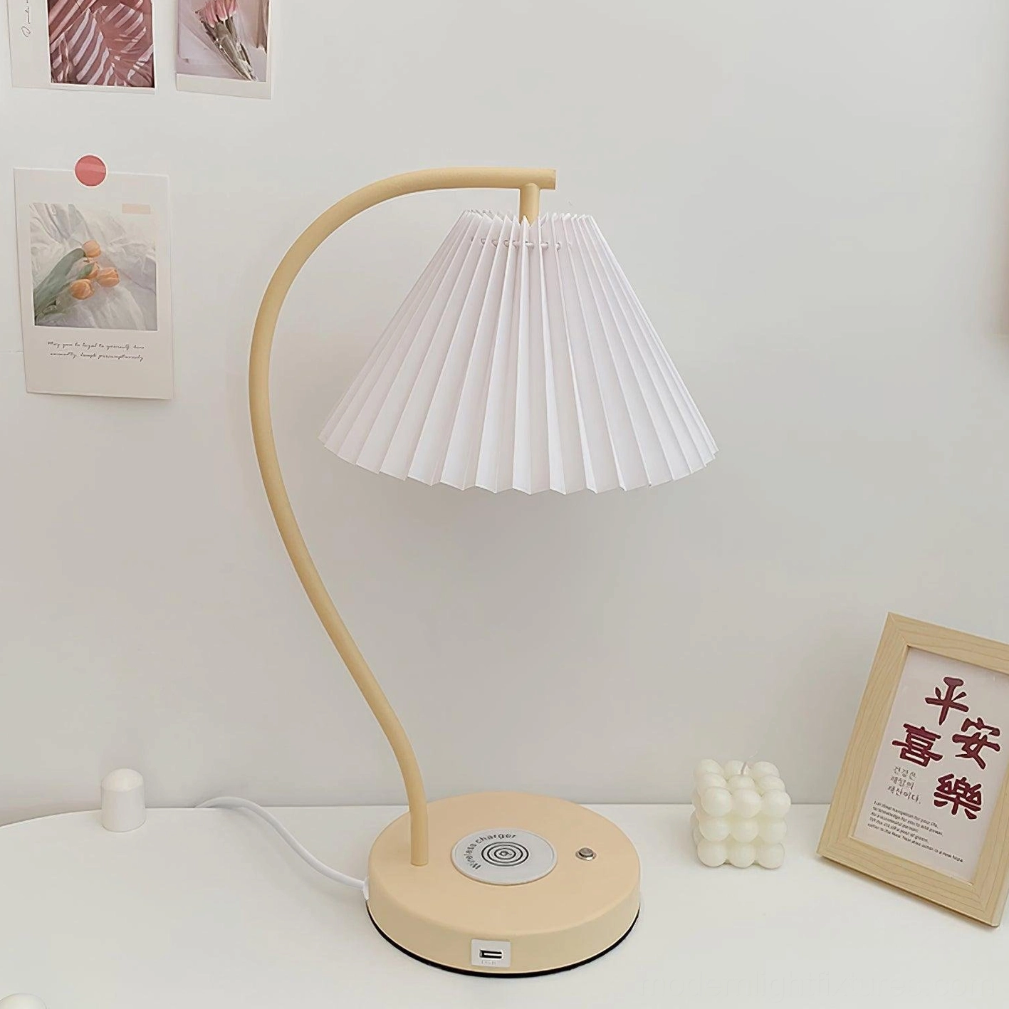 Pleated table lamp detail shot highlighting fabric shade texture and metal base construction