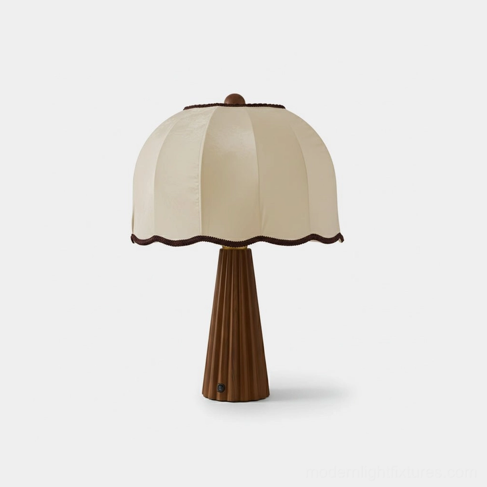 Pleated fabric table lamp with fluted wood base front view - cream shade with scalloped trim and walnut wooden base