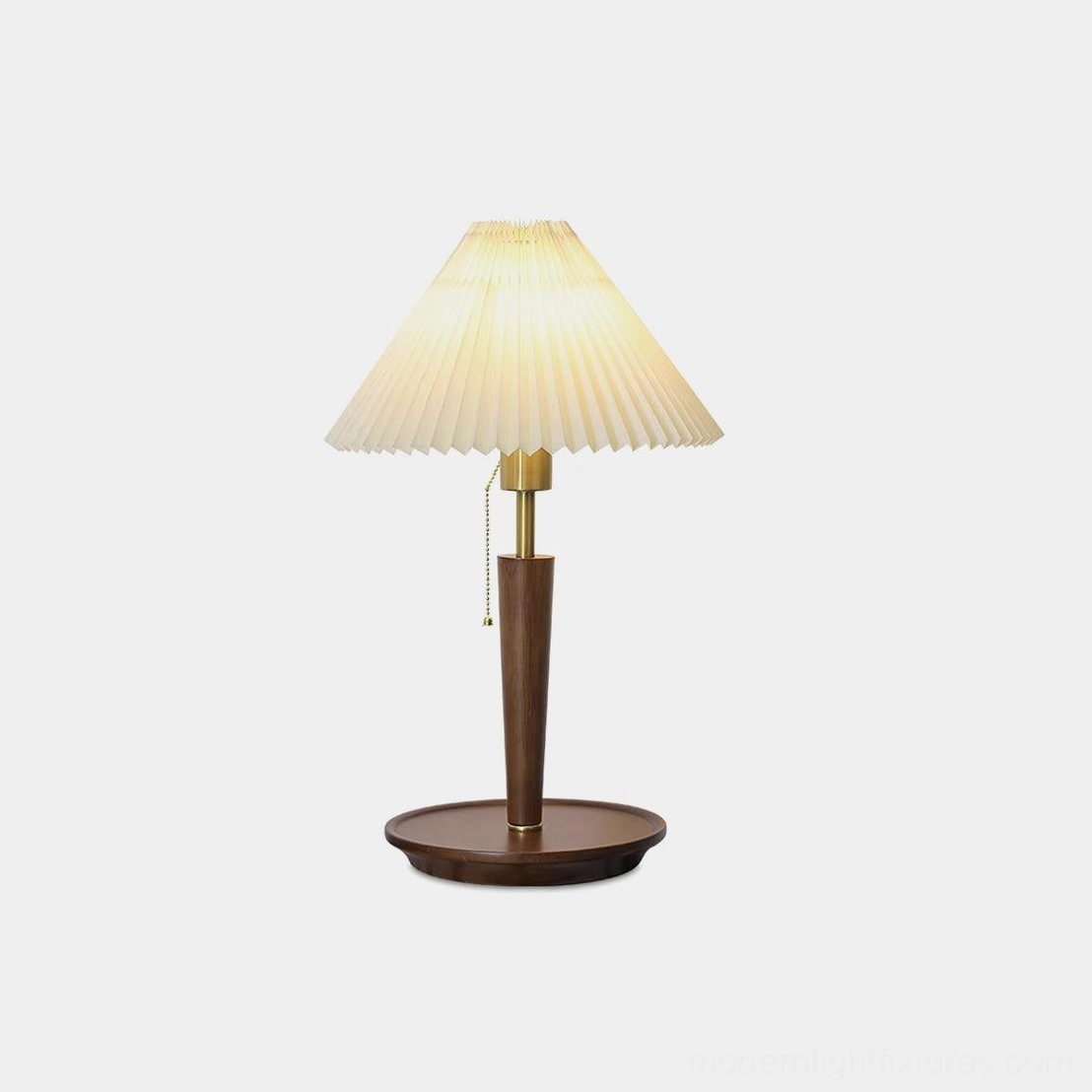 Suki pleated fabric table lamp with brass accents and solid wood base, front studio view on white background